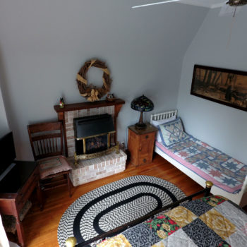 Sunrise room with queen bed on second floor.